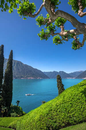 View to lake Como and Alpine mountains in Lombardy region, Italyの写真素材