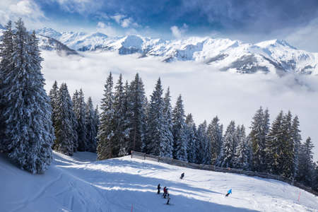 View to Alpine mountains in Austria from Kitzbuehel ski resort - one of the best ski resort in the workd with 54 cable cars, 170 km prepared skiing slopes and place of famous hahnenkamm races, Tyrol, Austriaの写真素材