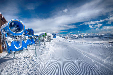 Snow cannons with fresh prepared ski slopes with the corduroy pattern in Kitzbuehel ski resort, Tyrol, Austriaのeditorial素材