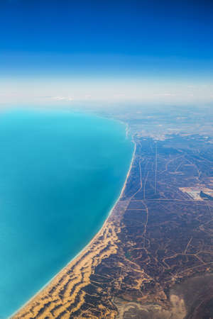 Airplane view to Spain coastline and Atlantic ocean.の写真素材