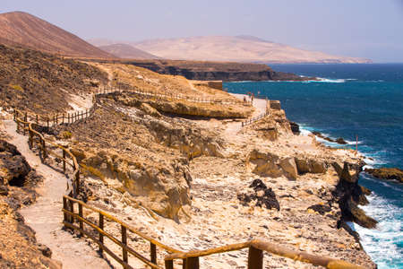 View to Ajuy coastline with vulcanic mountains on Fuerteventura island, Canary Islands, Spain.の写真素材