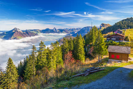 Fog surrounding Grosser, Kleiner Mythen, Lake Lucerne, Rigi mountain, Brunnen city and Weggis village from Klewenalp Swiss Alps, Central Switzerlandのeditorial素材