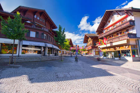 Old city center of Gstaad town, famous ski resort in canton Bern, Switzerland.のeditorial素材