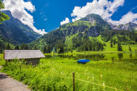 View to Lauenensee lake near Gstaad, Berner Oberland, Switzerland, Europe.の写真素材