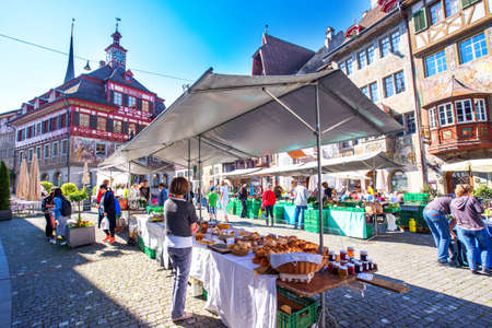 Traditional market in the old city center of Stein am Rhein village with colorful old houses, canton of Schaffhausen, Switzerland.のeditorial素材