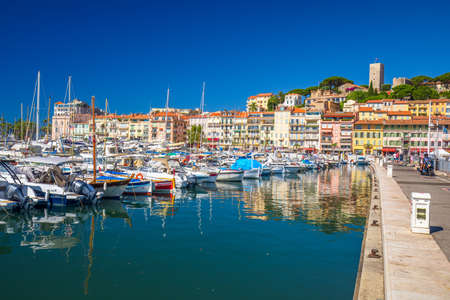 CANNES, FRANCE - July 2017 - Harbor in Cannes city with colorful houses and promenade, French riviera, France, Europe.のeditorial素材