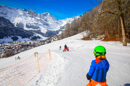 Child ready for skiing famous Ski resort in Alps.の写真素材