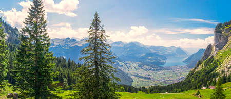 Beautiful summer landscape of Switzerland with Grosser Mythen mountain and green meadows,...