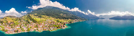 Village Weggis, lake Lucerne (Vierwaldstatersee), Rigi mountain and Swiss Alps in the background near famous Lucerne city, Switzerland.の写真素材