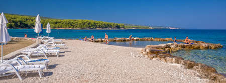 BRAC, CROATIA - August 6, 2018 - Stone beach on Brac island with turquoise clear ocean water, Supetar, Brac, Croatiaのeditorial素材