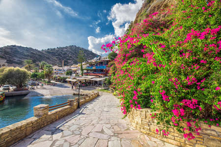 AGIA GALINI, CRETA - October 14, 2018 - Old town of Agial Galini with beautiful flowers, colorful houses and ocean, Creta, Greece, Europe.のeditorial素材