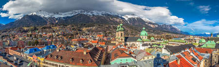 INNSBRUCK, AUSTRIA - March 11, 2017 - People in Innsbruck city center under Stadtturm tower. It is capital city of Tyrol in western Austria, Europe.のeditorial素材