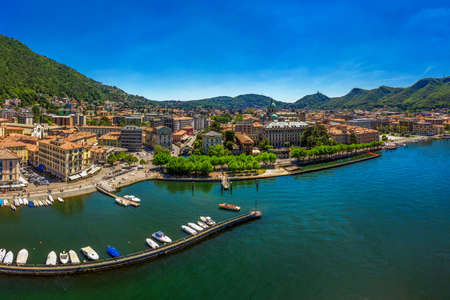 Como town on the Lake Como surrounded by mountains in the Italian region Lombardy, Italy, Europe.の写真素材