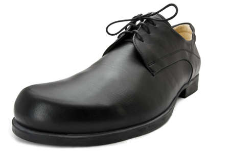 single black business leather shoe shot with wide angle lens. White backgroundの写真素材