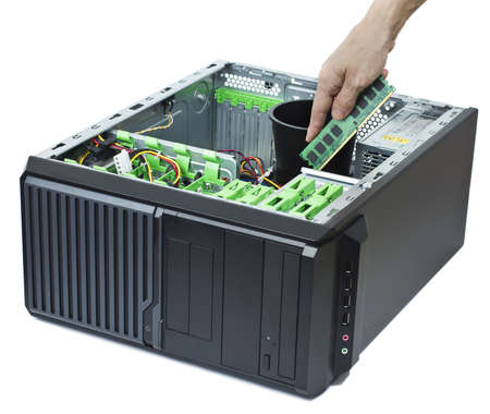 inserting memory into open computerの写真素材
