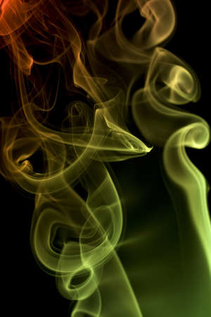 Smoke on black background with nice fancy wave patterns. Useful for abstract backgroundsの写真素材