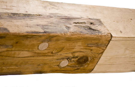 wooden assembly restoration made by a carpenter with treenailの写真素材
