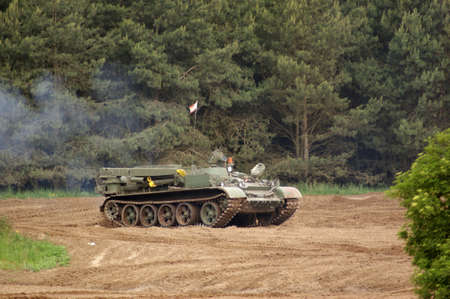 offroad scenery showing a old tank of the "Nationale Volksarmee" in Germany, now used for a private tank driving schoolのeditorial素材
