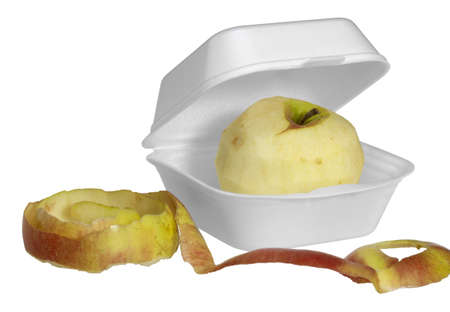 apple in a white fastfood box isolated on whiteの写真素材