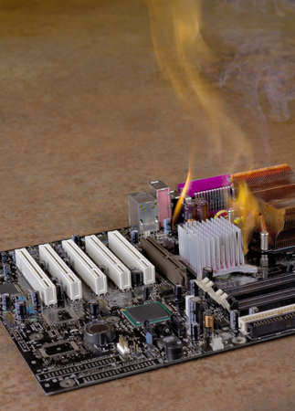 flames on burning main-board in rusty background