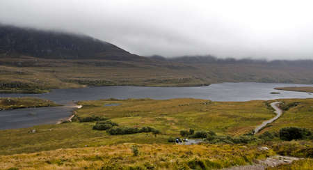 rural landscape in north scotland with lake and wetlandの写真素材