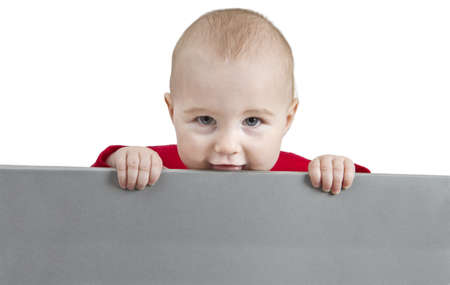 young child holding sign. isolate on white backgroundの写真素材