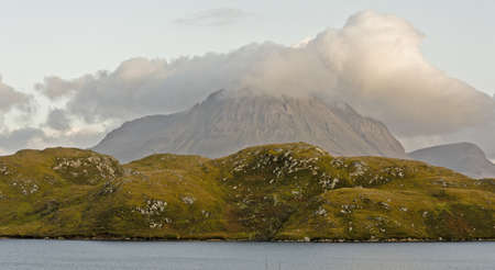 sea, hill and mountain in cloud. landscape in scotlandの写真素材