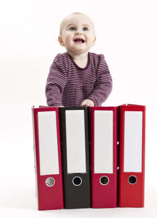 young child in light background with four ring filesの写真素材