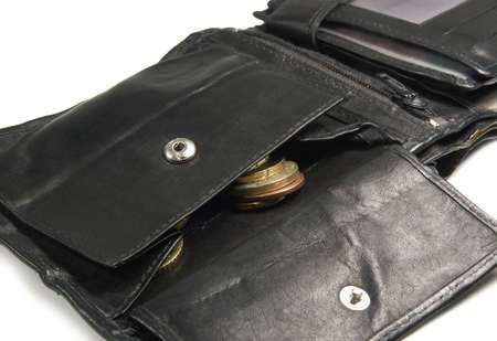 detail of a open old moneybag with some coins in it,  isolated on white with shadowの写真素材