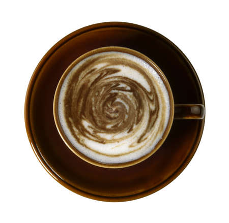 studio photography of a coffee cup with weird milk froth decoration, isolated on white with clipping path, seen from aboveの写真素材