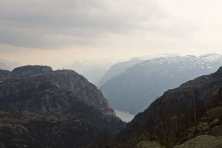mountains and fjord in norway with cloudy skyの写真素材
