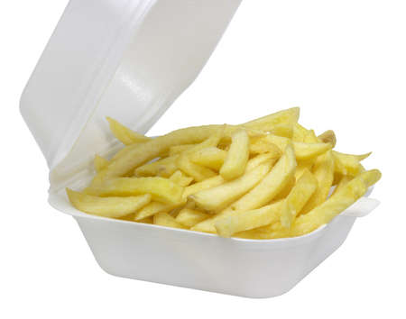 some french fries in a white plastic box in white backの写真素材