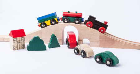 toy traffic with car and train isolated on grey horizontal imageの写真素材