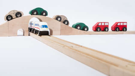 toy traffic with car and train isolated on grey background  horizontal imageの写真素材