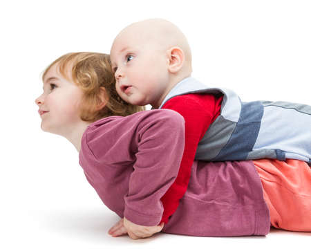 boy and girl looking to side isolated on white backgroundの写真素材