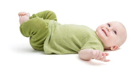 happy toddler isolated on white background  green clothingの写真素材