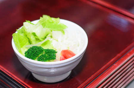 Vegetable salad mix in bowl on 
trayの写真素材