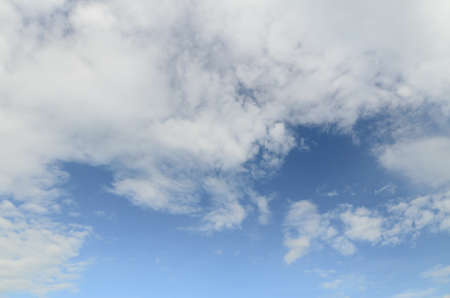 White fluffy clouds in  blue sky and spaceの写真素材