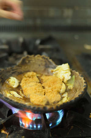 pork fried and cabbage boil in soup japan put on gas stoveの写真素材