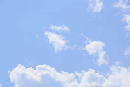 White fluffy clouds in  blue sky and spaceの写真素材