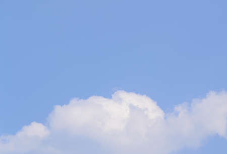 White fluffy clouds in  blue sky and spaceの写真素材