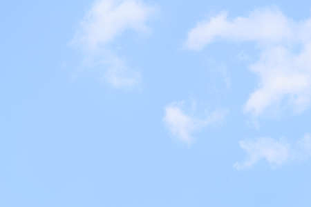 White fluffy clouds in  blue sky and spaceの写真素材