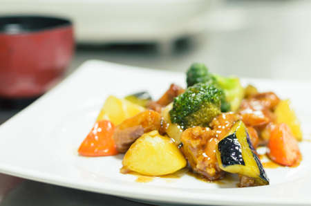 Chicken and vegetable 
intermix in vinegar sauce  put on white plateの写真素材