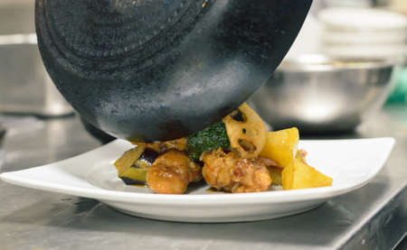 Chicken and vegetable 
intermix in vinegar sauce  put on white plateの写真素材