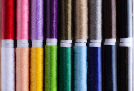 Sewing threads stand in a line colorの写真素材