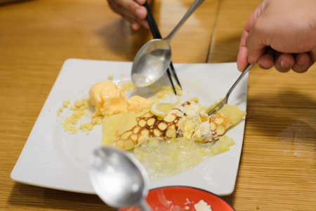 Ice cream melon and crape on dishの写真素材