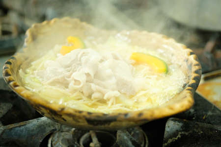 Food steaming in clay potの写真素材