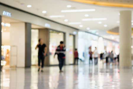 Blurred shopping mall ,people shop in sell timeの写真素材