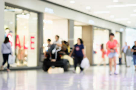 Blurred shopping mall ,people shop in sell timeの写真素材