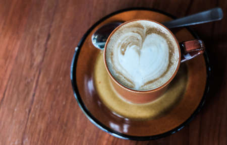 Coffee latte art on table,copy spaceの写真素材
